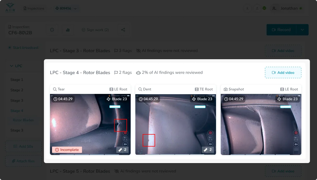 Overview with an expanded row highlighted — LPC Stage 4 Rotor Blades, 21.2 flags, 2% of AI findings not reviewed, multiple videos aggregated into a single findings carousel beneath the header
